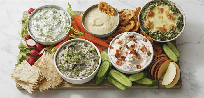 A Tray With 5 Different Dips