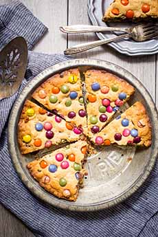 M&M Cookie Pie with M&Ms pressed into the top.