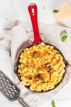 A skillet of macaroni and cheese.