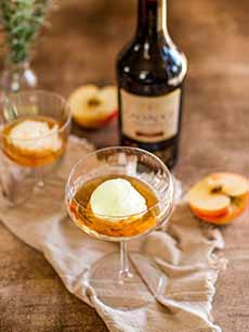 A dish of apple sorbet with Calvados poured over it.