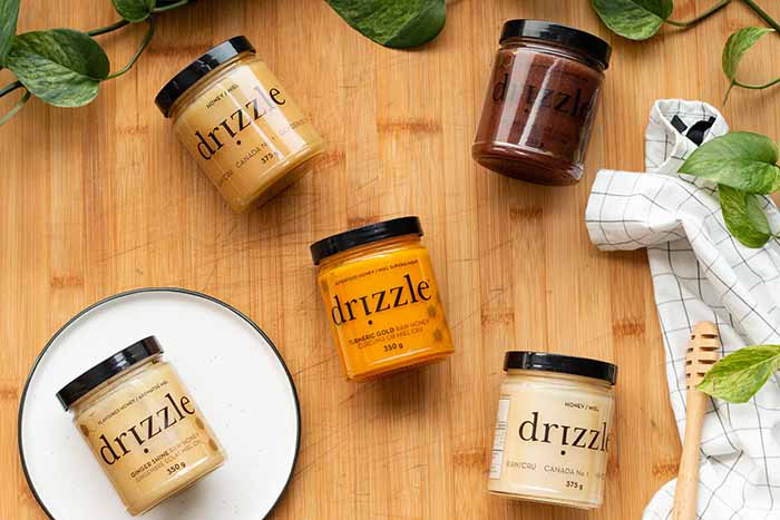 Jars Of Drizzle Honey Flavors
