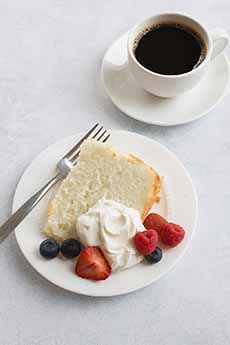 Angel Food Cake with berries and whipped cream