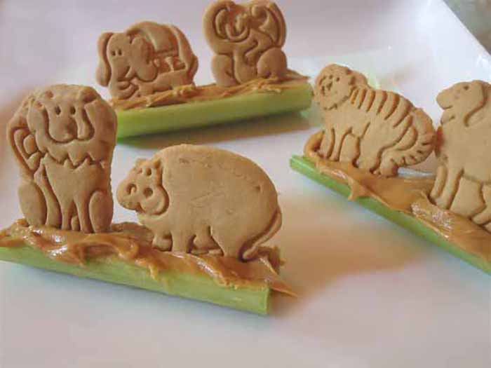 Animal Crackers On A Log (anchored with peanut butter on a celery stick)