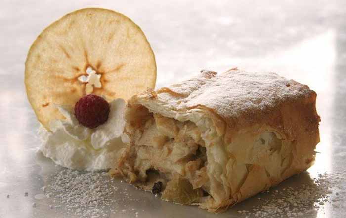 A Slice Of Apple Strudel With Whipped Cream