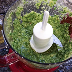 Making Arugula Pesto In A Food Processor