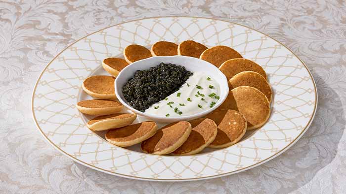 A Platter Of Blini With Avruga Caviar