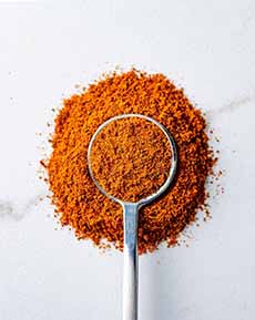 A spoon of baharat Middle Eastern spice blend