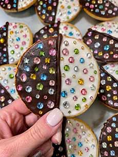 Black and white cookies with edible "rhinestones."