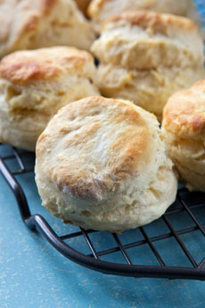 Buttermilk biscuits cooling on a wire rack