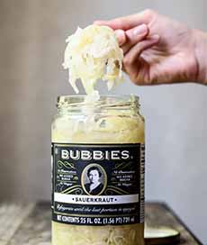 An open jar of Bubbie's Sauerkraut