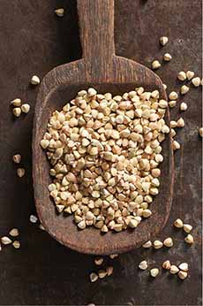 A Measuring Spoon Of Buckwheat Groats