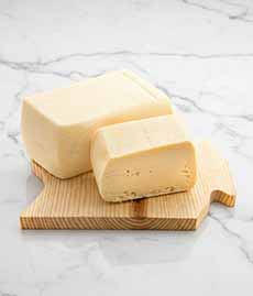 Butterkase Cheese On A Cutting Board