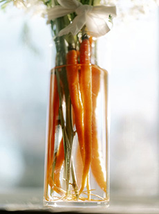 Bouquet Of Carrots In A Vase