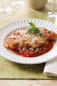 A plate of Chicken Parmigiana, Chicken Parm for short.