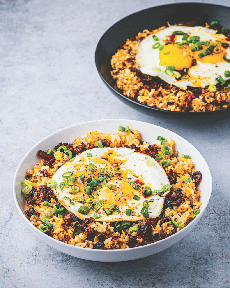 Fried rice with a poached egg and Chinese sausage.