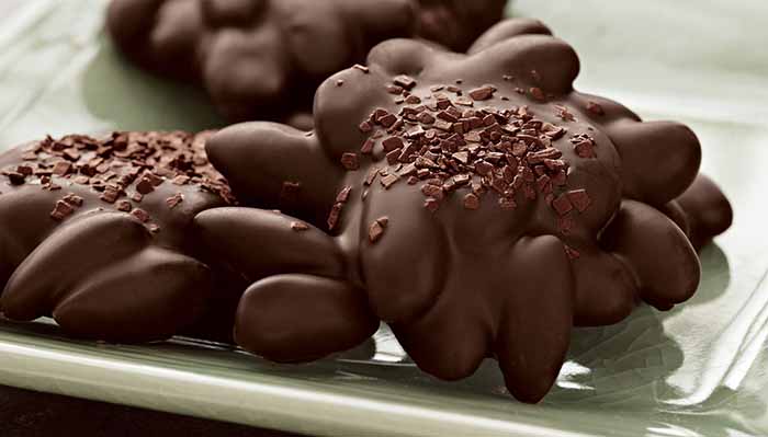 A Plate Of Chocolate Nut Clusters