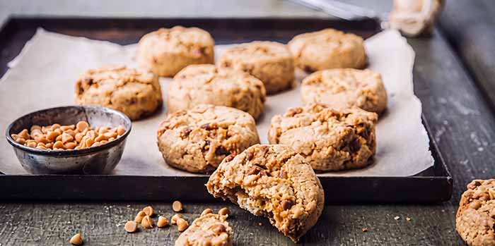 Chocolate chip cookies made with Callebaut blonde baking chips.
