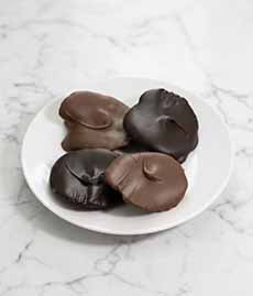 A Plate Of Chocolate-Covered Potato Chips