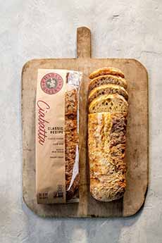 Loaf of ciabatta bread on a cutting board