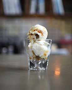 A Rocks Glass Of Coconut Dulce De Leche Ice Cream From Dolcezza Gelato