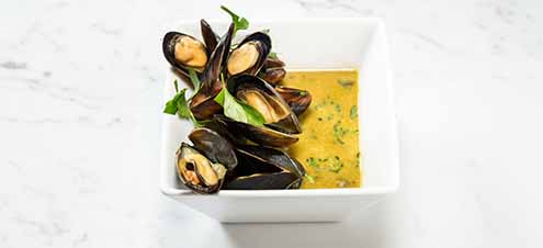 A Bowl Of Thai Curry Mussels