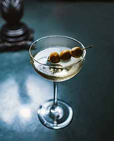 A Dirty Martini With Olives