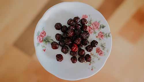 A Plate Of Dried Cherries