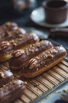 Eclairs Decorated With Pecans