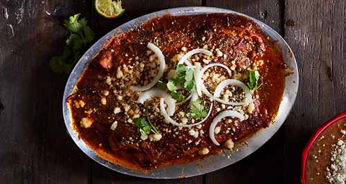 A Platter Of Enchiladas Rojas