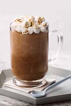 Glass Mug Of Frozen Hot Chocolate With Mini Marshmallows On Top