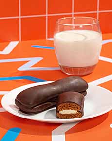 Fudge Dipped Devil Dogs with a glass of milk