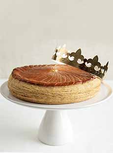 Gateau des Rois, Epiphany Cake, with a gold paper crown