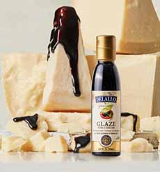 Wedges of Parmigiano-Reggiano cheese with balsamic glaze