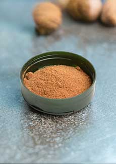 A Small Dish Of Ground Nutmeg