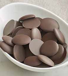 A bowl of Guittard Milk Chocolate Wafers