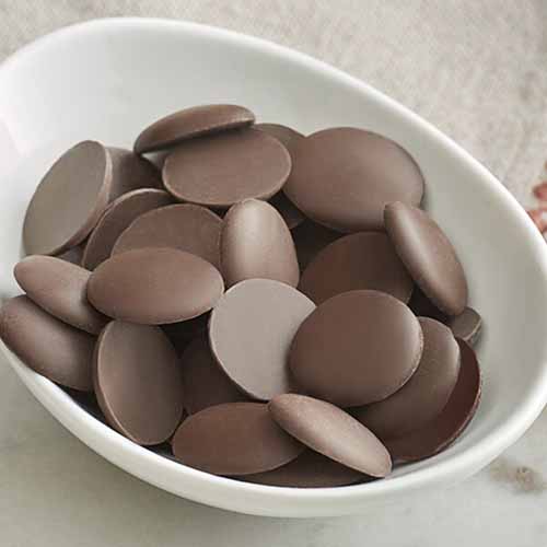 A bowl of Guittard Chocolate Disks