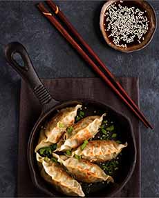 A Plate Of Gyoza Dumplings
