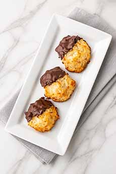A Plate Of Chocolate-Dipped Macaroons