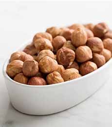 A bowl of hazelnuts.