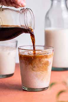 A glass of horchata latte: espresso and horchata.