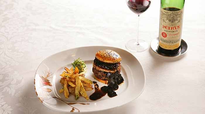 Hubert Keller's $6,000 cheeseburger with a bottle of Petrus.