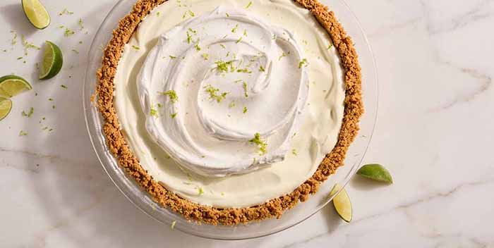 A Key lime pie with whipped topping.