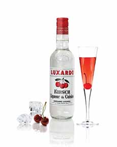 A Bottle Of Luxardo Kirschwasser With A Cherry Cocktail