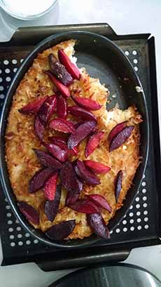 Noodle Kugel Baked With A Purple Plum Garnish