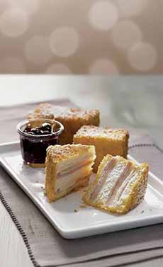 A Monte Cristo sandwich with a side of dipping jelly.