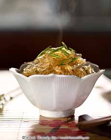 A dish of glass noodles: cooked mung bean threads
