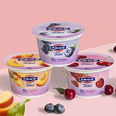 Three containers of FAGE fruit-flavored 0% fat Greek yogurt