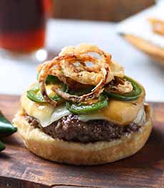 Cheeseburger With Onion Rings & Sliced Jalapenos