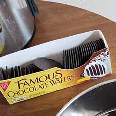 An open box of Nabisco Famous chocolate wafers