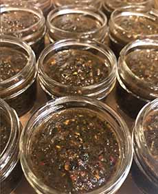 Open Jars Of Black Salsa